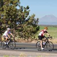 Cycling by peaks and pastures with good company
