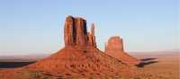 The Monument Valley buttes, on the Utah - Arizona border, lights up at sunset | Brad Atwal