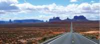 A long open road through Monument Valley | Jake Hutchins