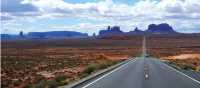 A long open road through Monument Valley | Jake Hutchins