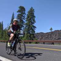 Pedaling by the volcanic landscape of McKenzie Pass!