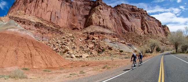 Cycling amongst the towering red cliffs